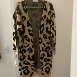 New with tags! Leopard print open cardigan with pockets! Fits like a large!
